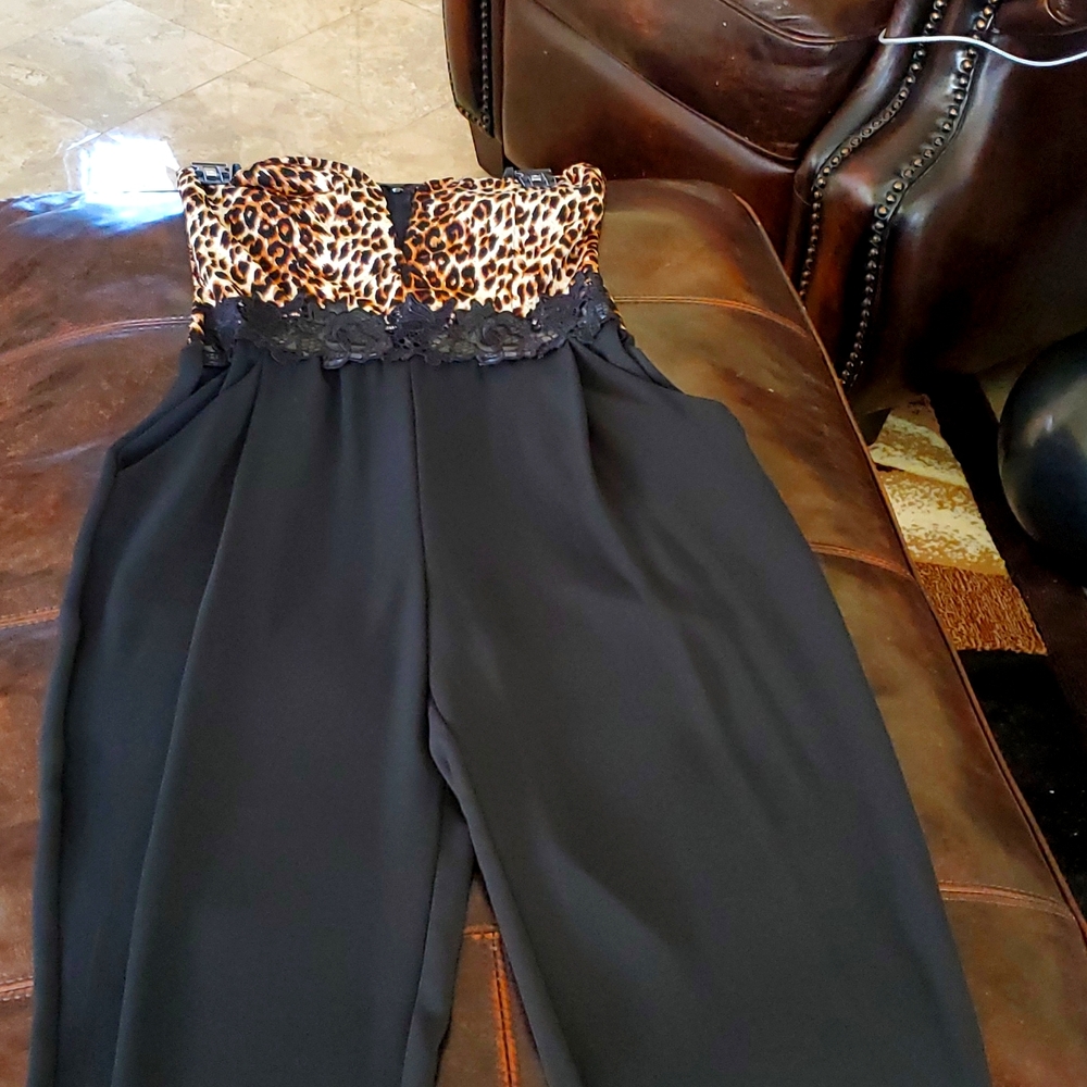 Black and Animal prints jumpsuits.Used
